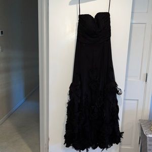 Jovani sweet heart neckline with rose embossed bottom!